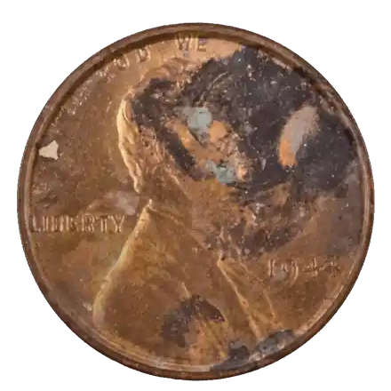 A cent from the collection, turning to show both faces